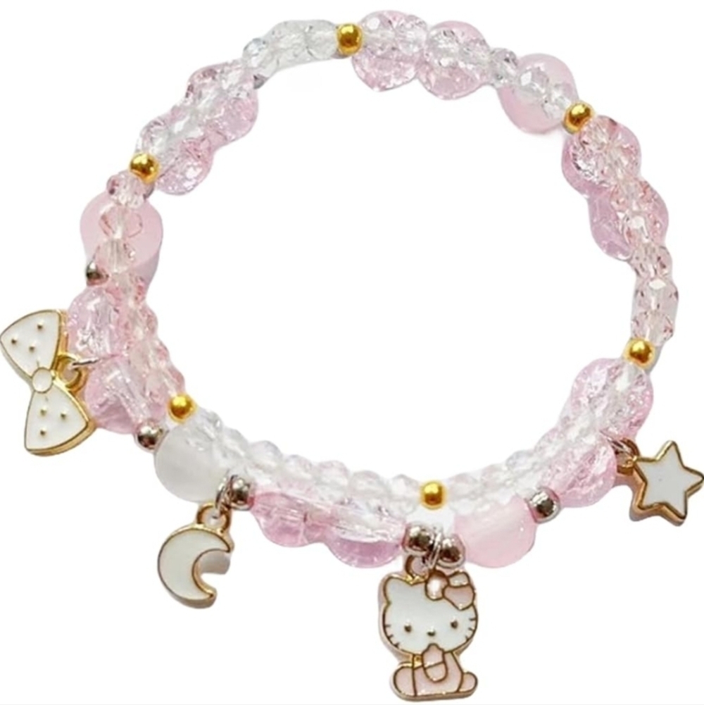Pink clear plastic beaded ladies bracelet with Hello Kitty and moon star charms